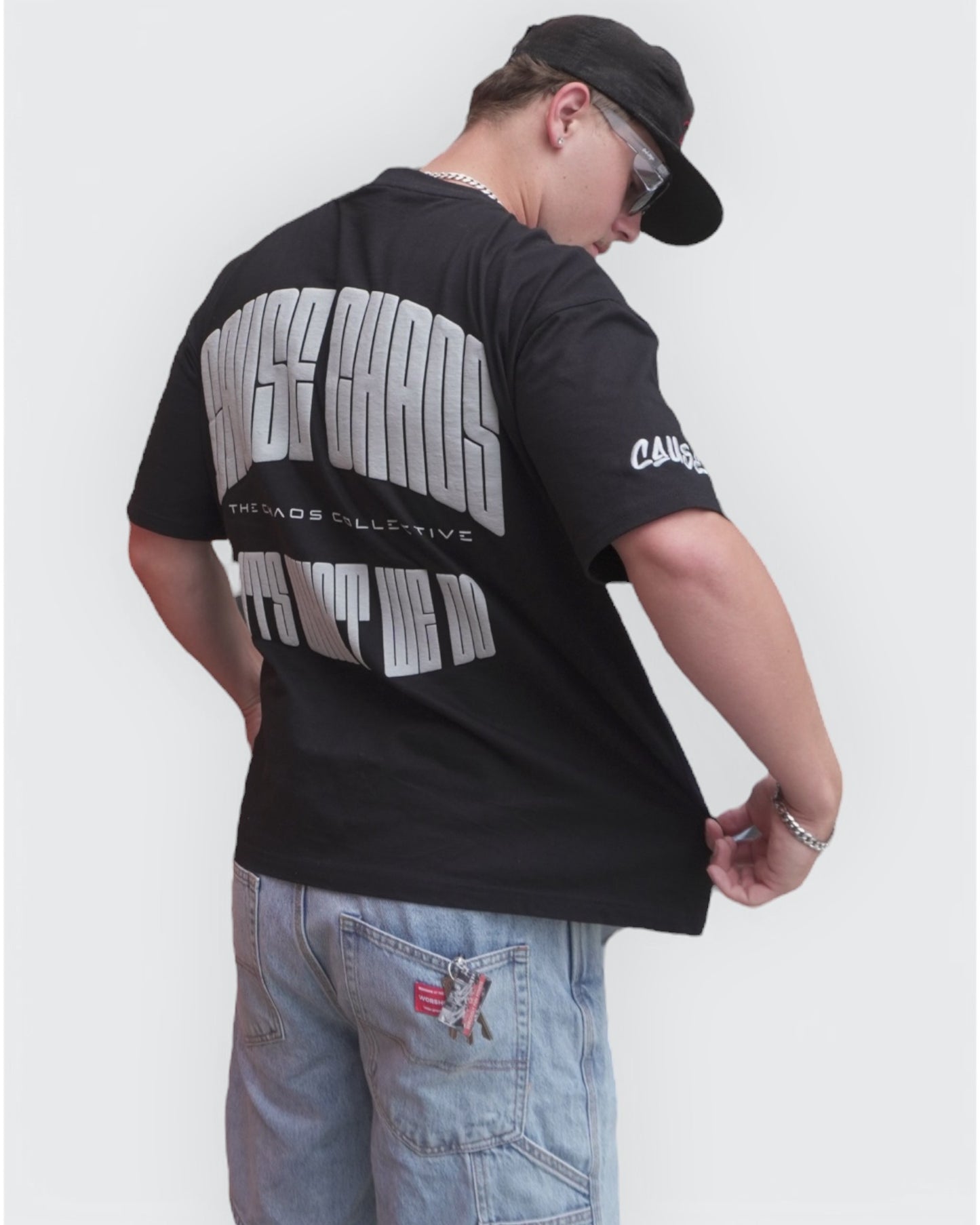IT’S WHAT WE DO! BLACK/GREY PUFF TEE
