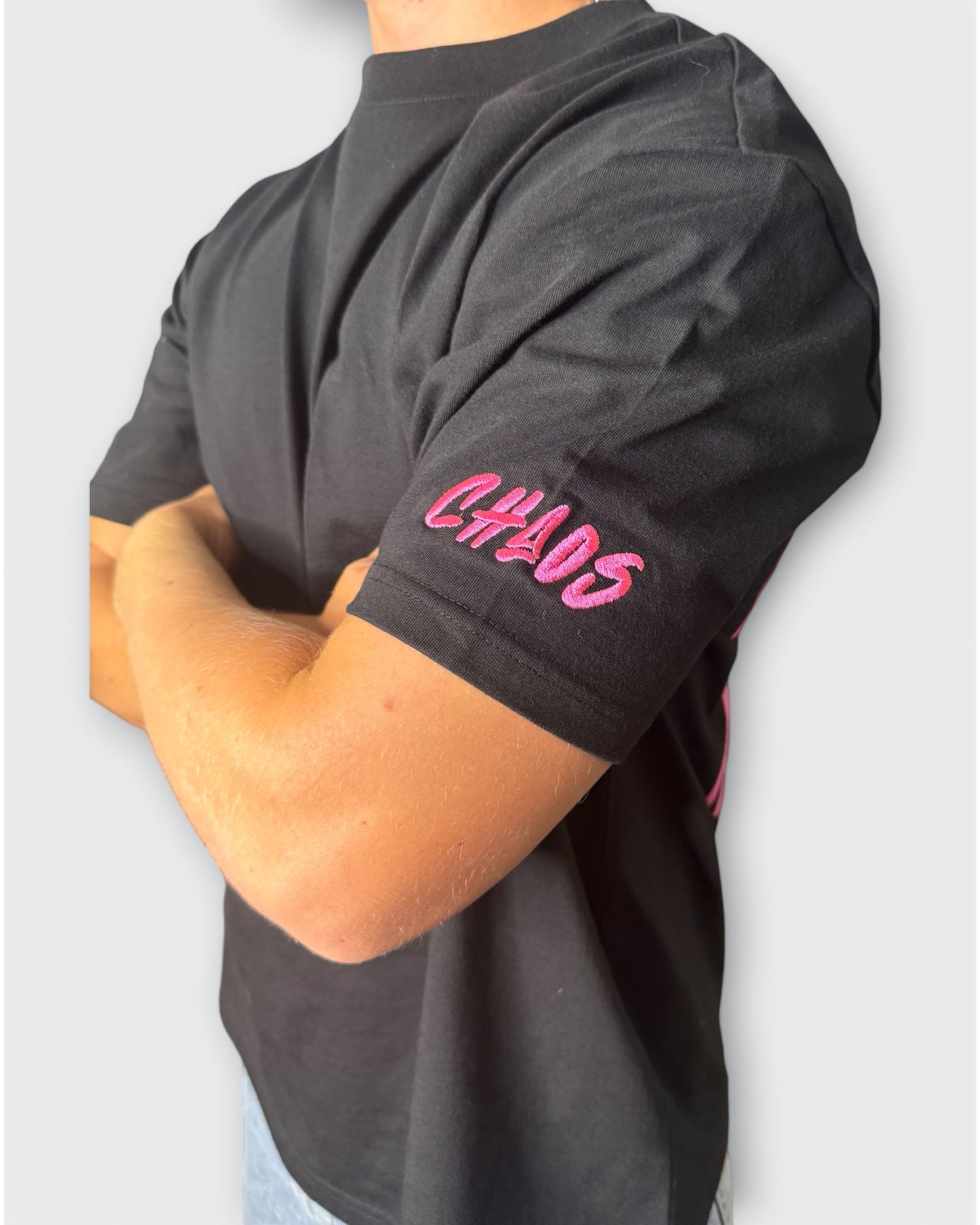 IT’S WHAT WE DO! BLACK/PINK PUFF TEE