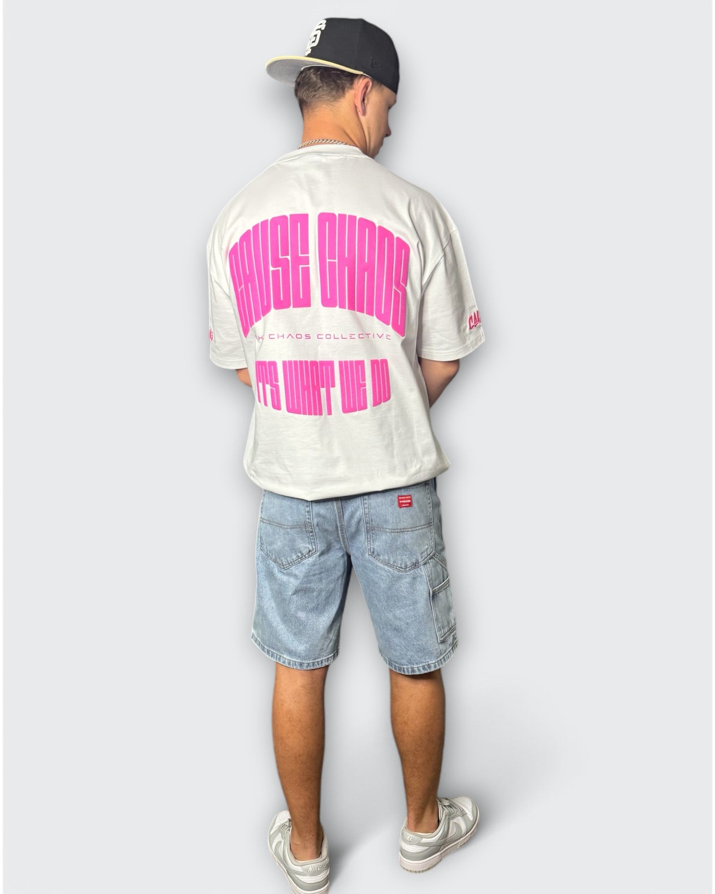 IT’S WHAT WE DO! WHITE/PINK PUFF TEE