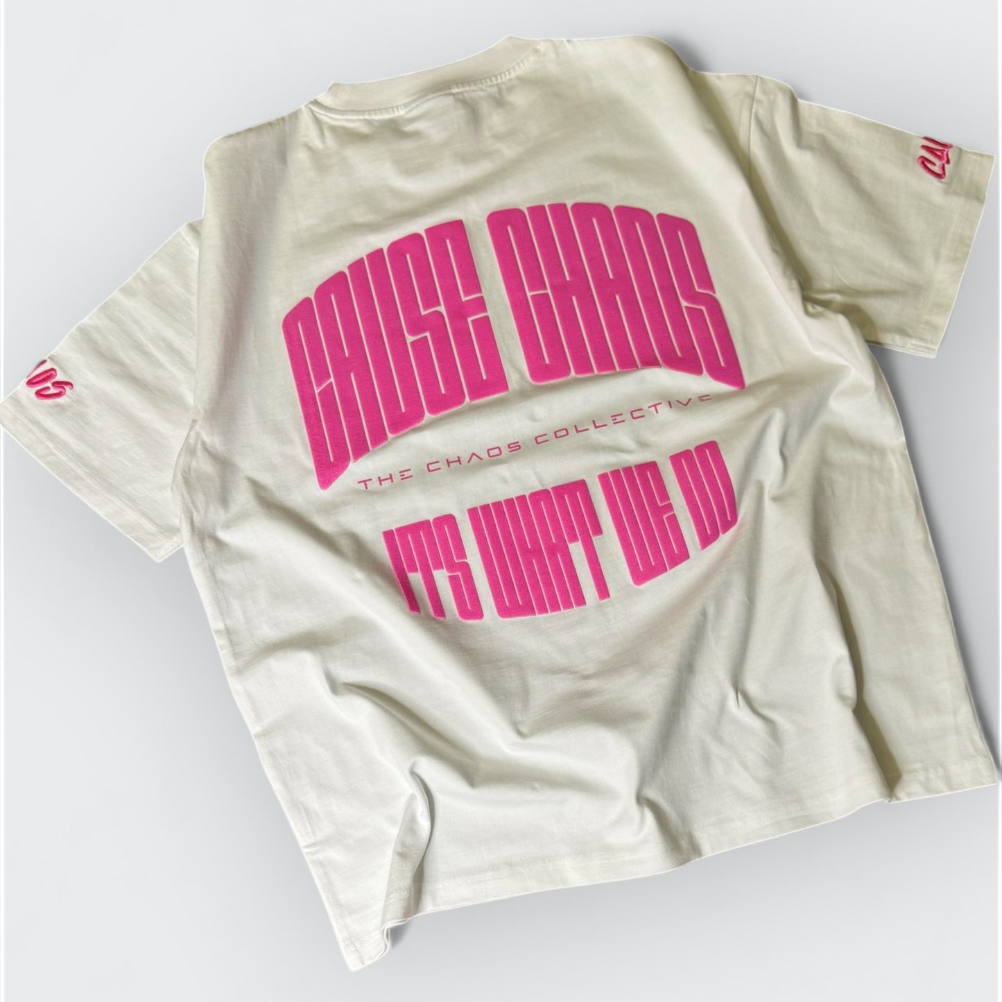 IT’S WHAT WE DO! WHITE/PINK PUFF TEE