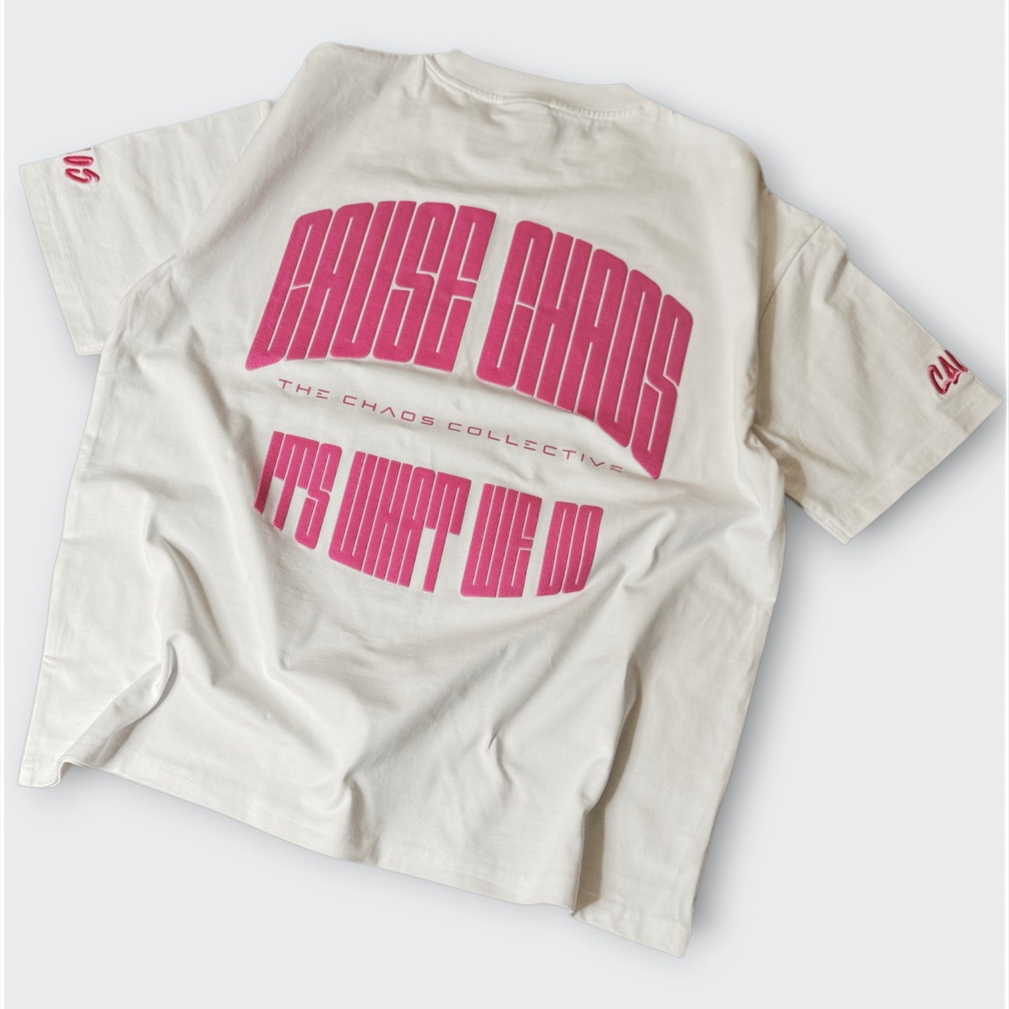 IT’S WHAT WE DO! WHITE/PINK PUFF TEE