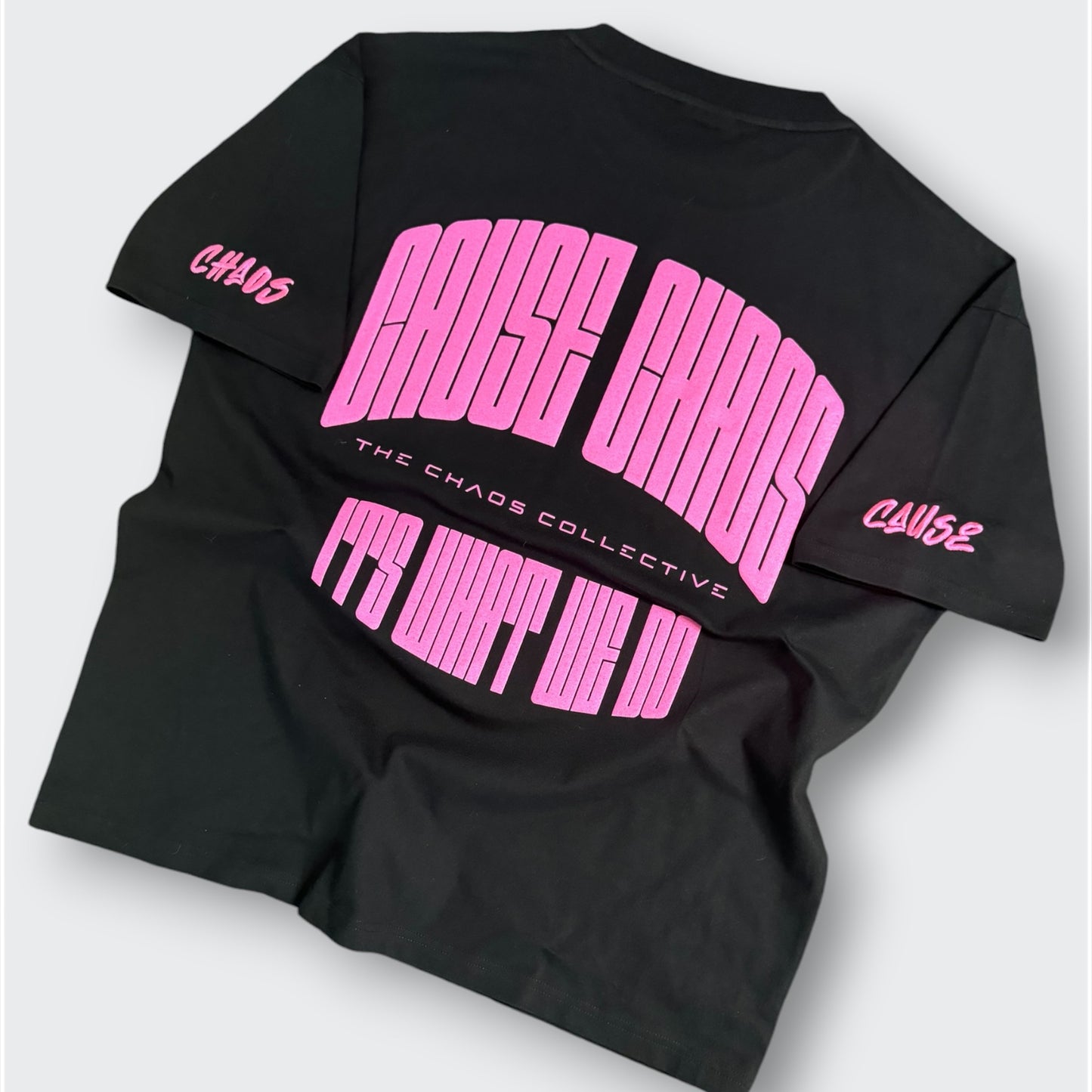 IT’S WHAT WE DO! BLACK/PINK PUFF TEE