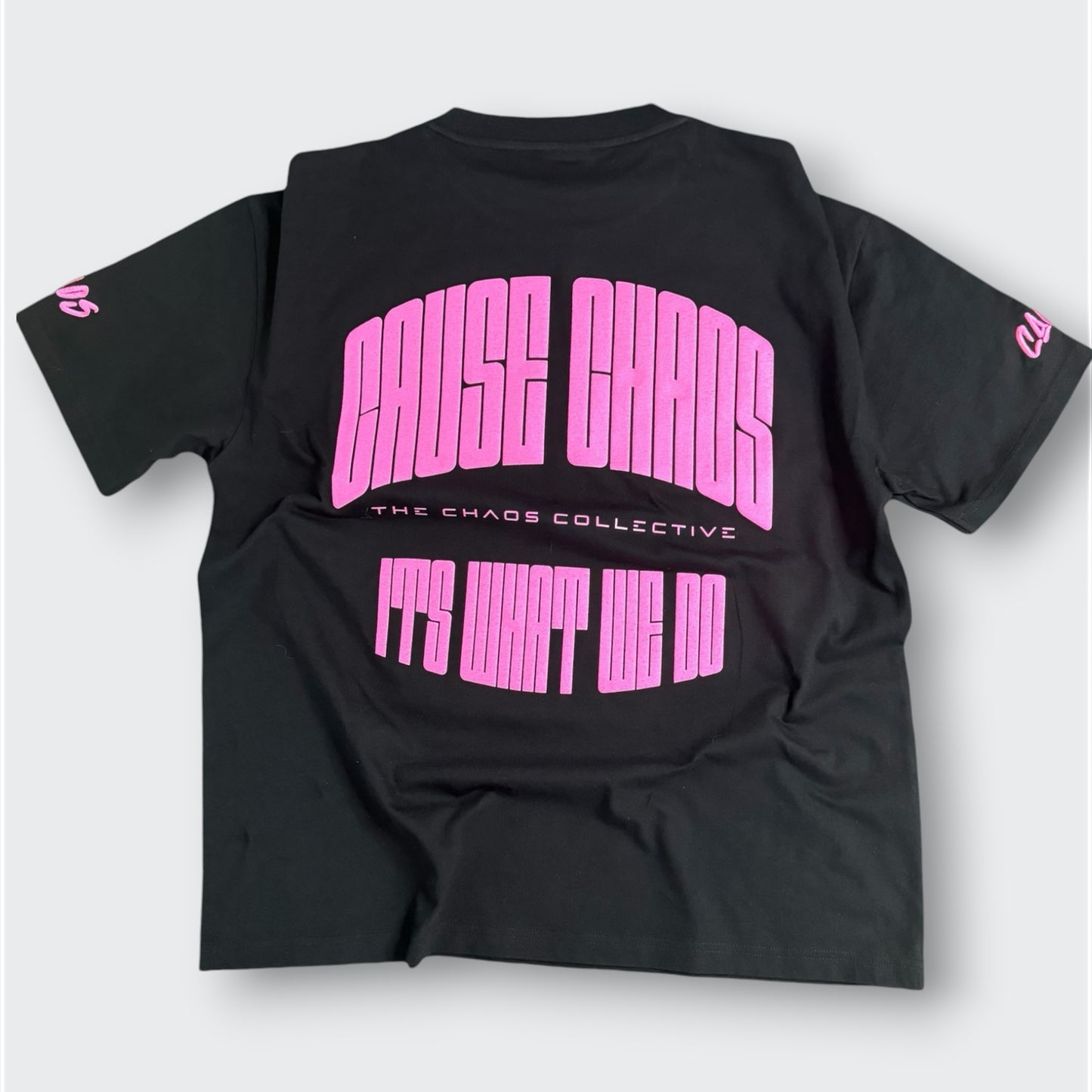 IT’S WHAT WE DO! BLACK/PINK PUFF TEE