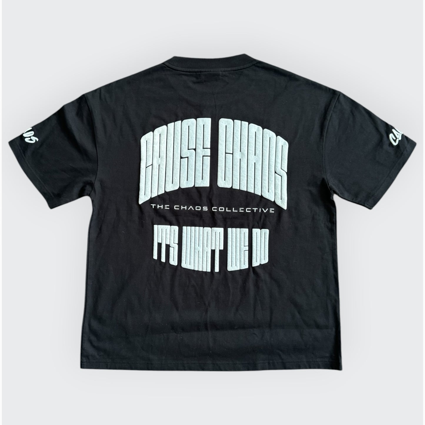 IT’S WHAT WE DO! BLACK/GREY PUFF TEE