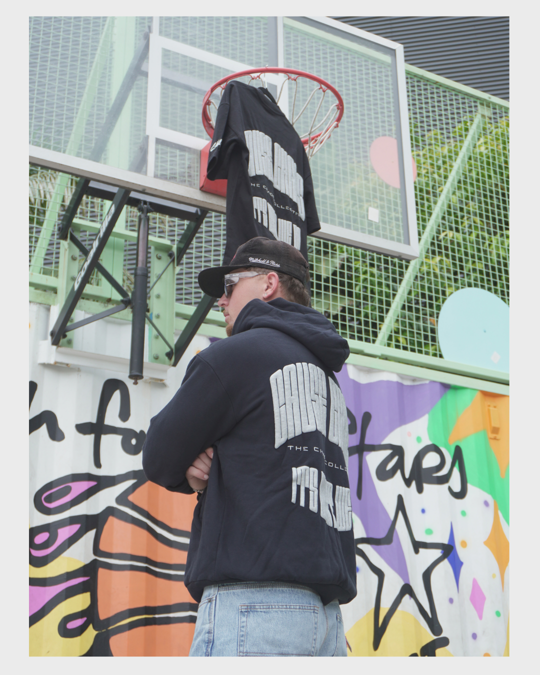 IT’S WHAT WE DO! BLACK PUFF HOODIE - Back View